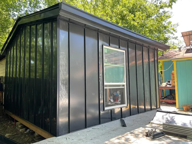 Black standing seam metal wall panels for Roof Inspection in Pontotoc